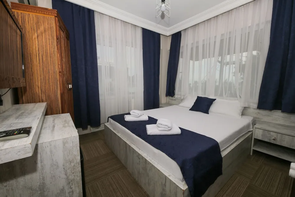Deluxe Tek Büyük Yataklı Oda, Sigara İçilebilir, Deniz Manzaralı