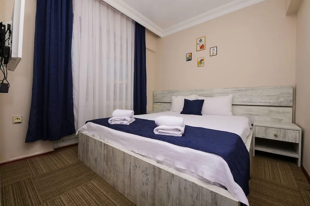 Deluxe Tek Büyük Yataklı Oda, Sigara İçilebilir, Deniz Manzaralı