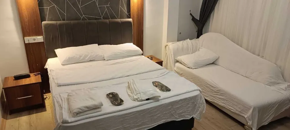 Classic Tek Büyük veya İki Ayrı Yataklı Oda