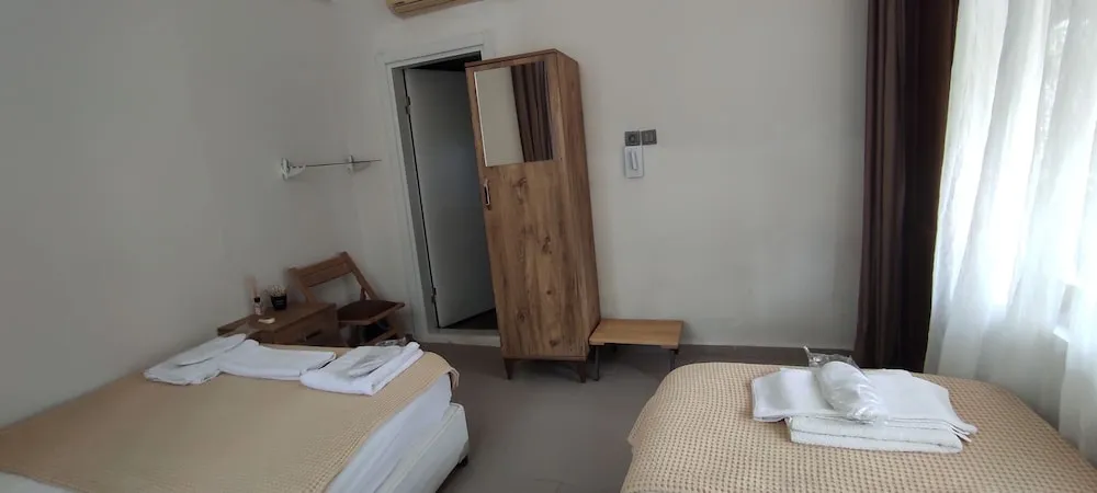 Deluxe Üç Kişilik Oda