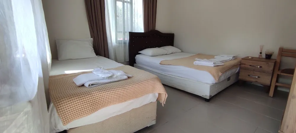 Deluxe Üç Kişilik Oda