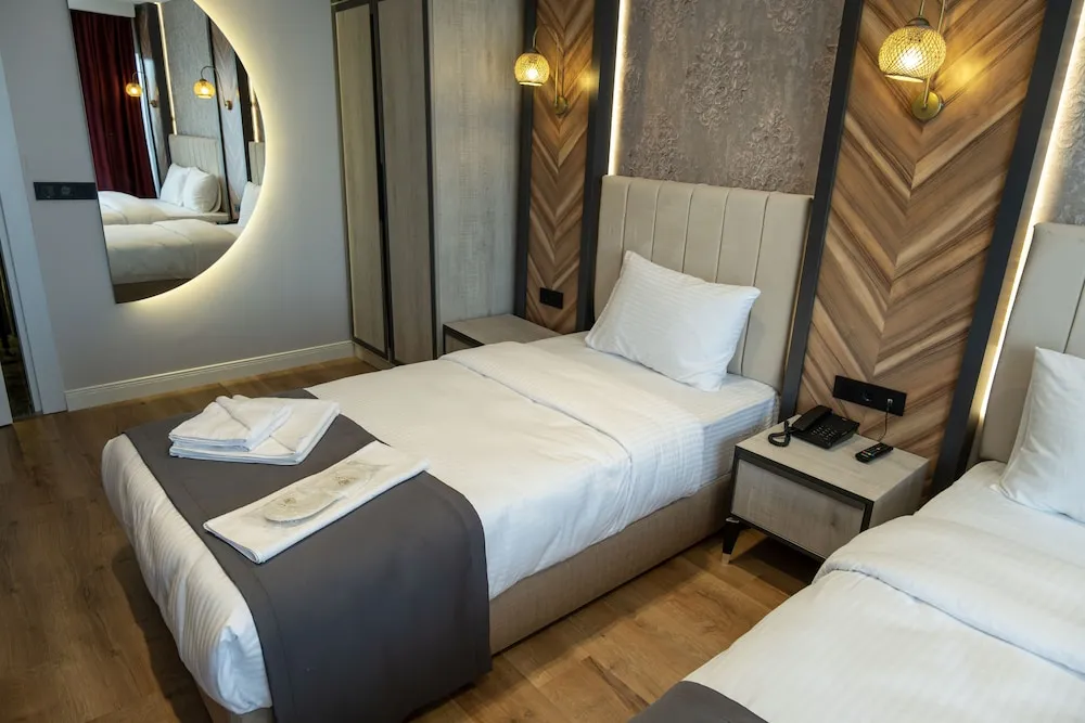 Economy Üç Kişilik Oda