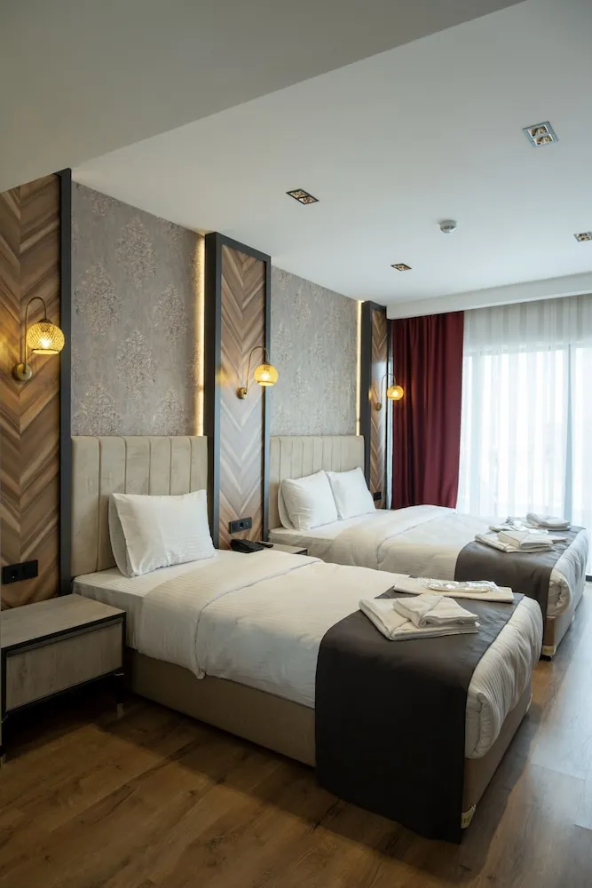 Economy Üç Kişilik Oda