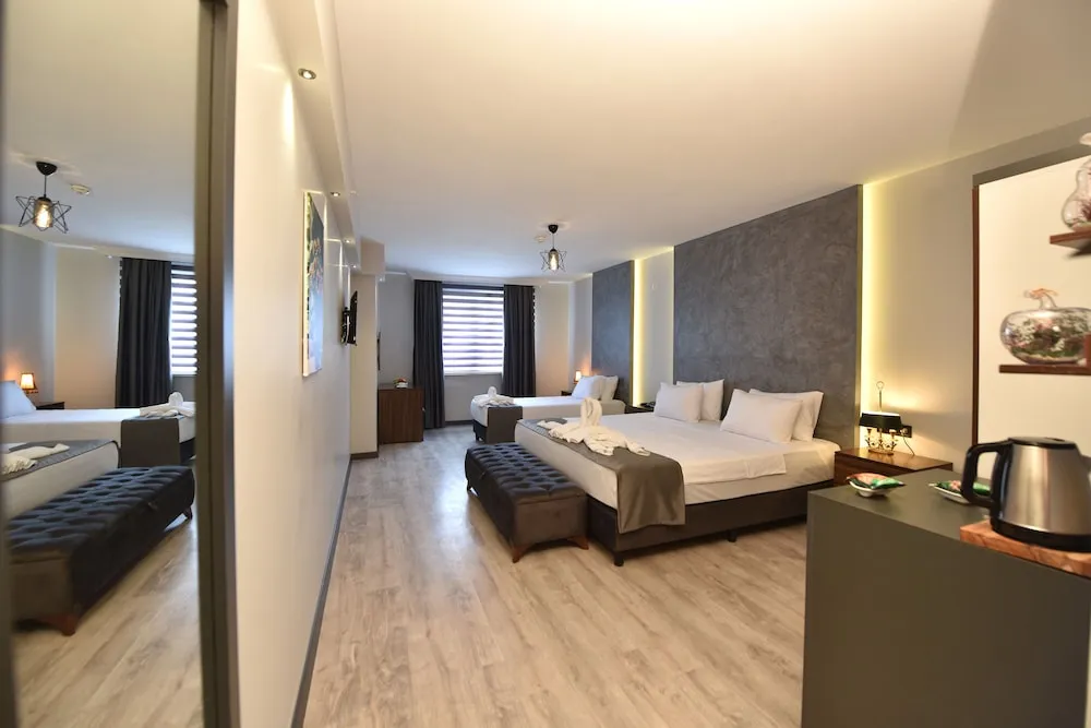 Deluxe Üç Kişilik Oda