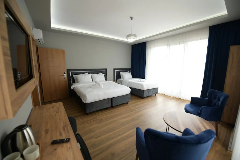 Deluxe Üç Kişilik Oda
