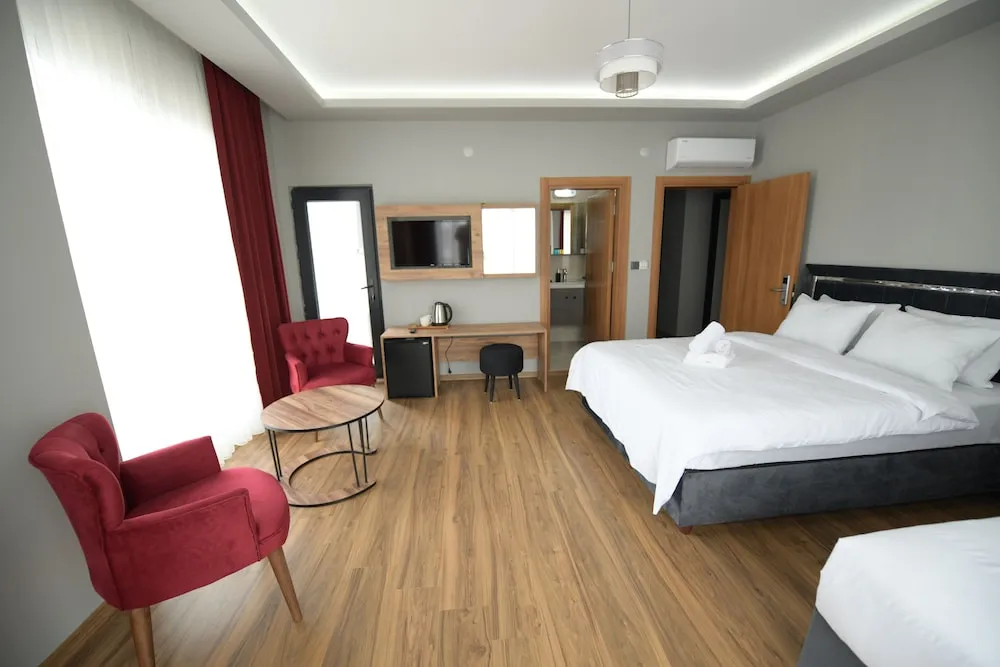 Deluxe Üç Kişilik Oda