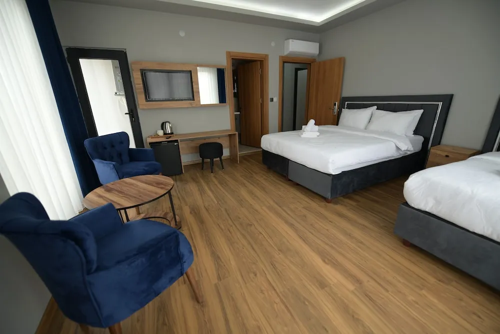 Deluxe Üç Kişilik Oda