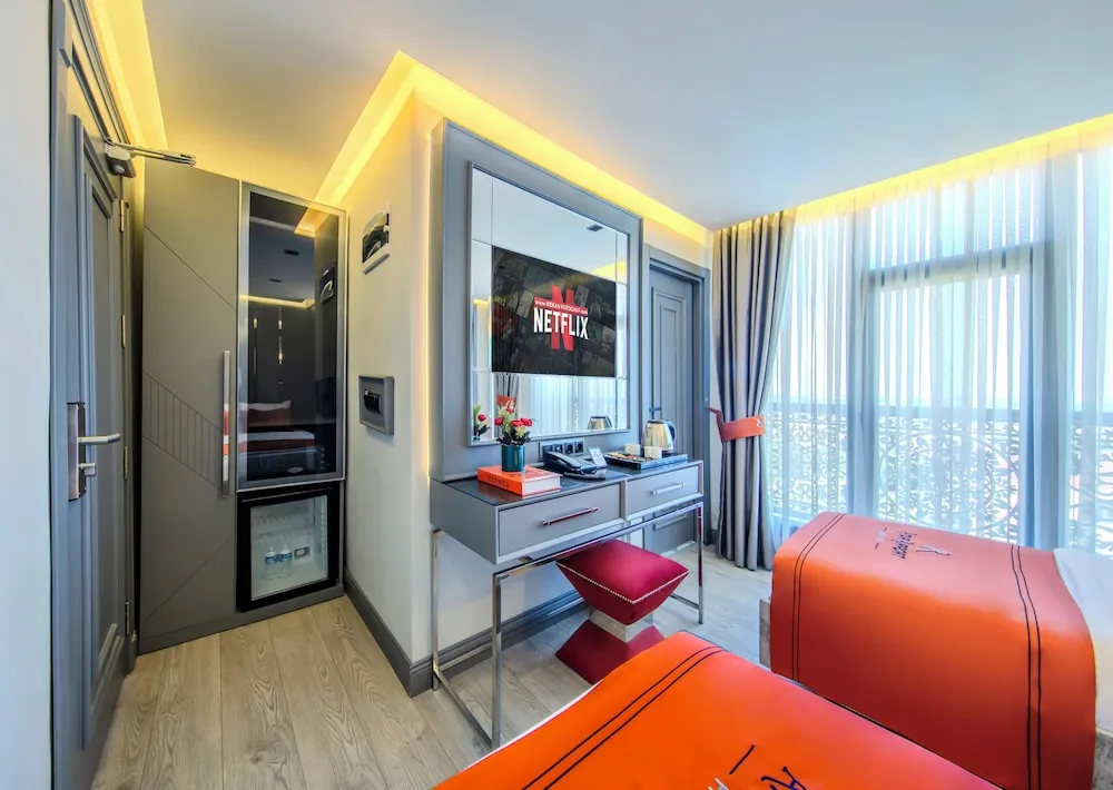 Deluxe Tek Büyük veya İki Ayrı Yataklı Oda