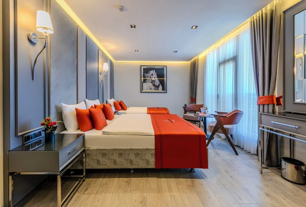 Deluxe Üç Kişilik Oda
