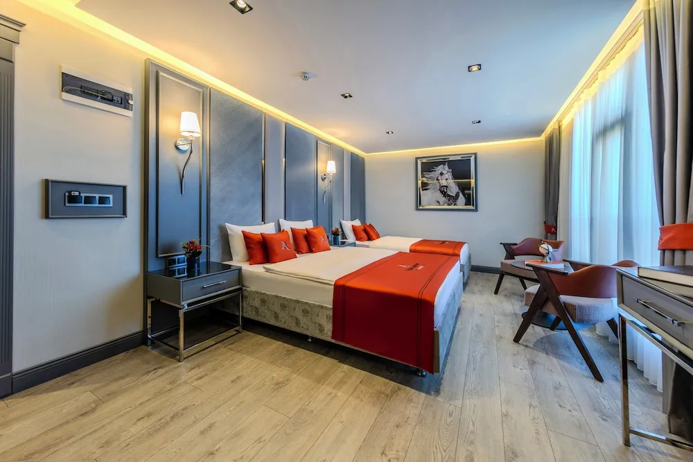 Deluxe Üç Kişilik Oda