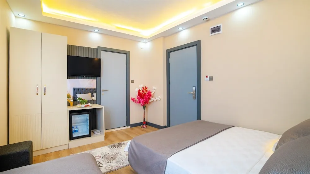 Deluxe Üç Kişilik Oda, Sigara İçilmez, Şehir Manzaralı
