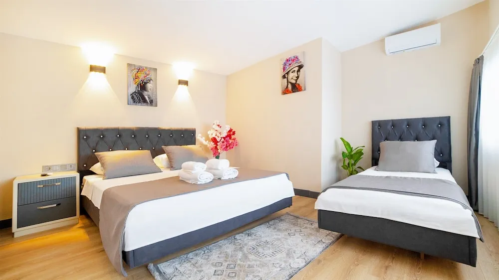 Deluxe Üç Kişilik Oda, Sigara İçilmez, Şehir Manzaralı