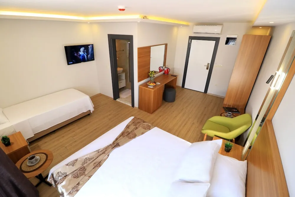 Deluxe Üç Kişilik Oda