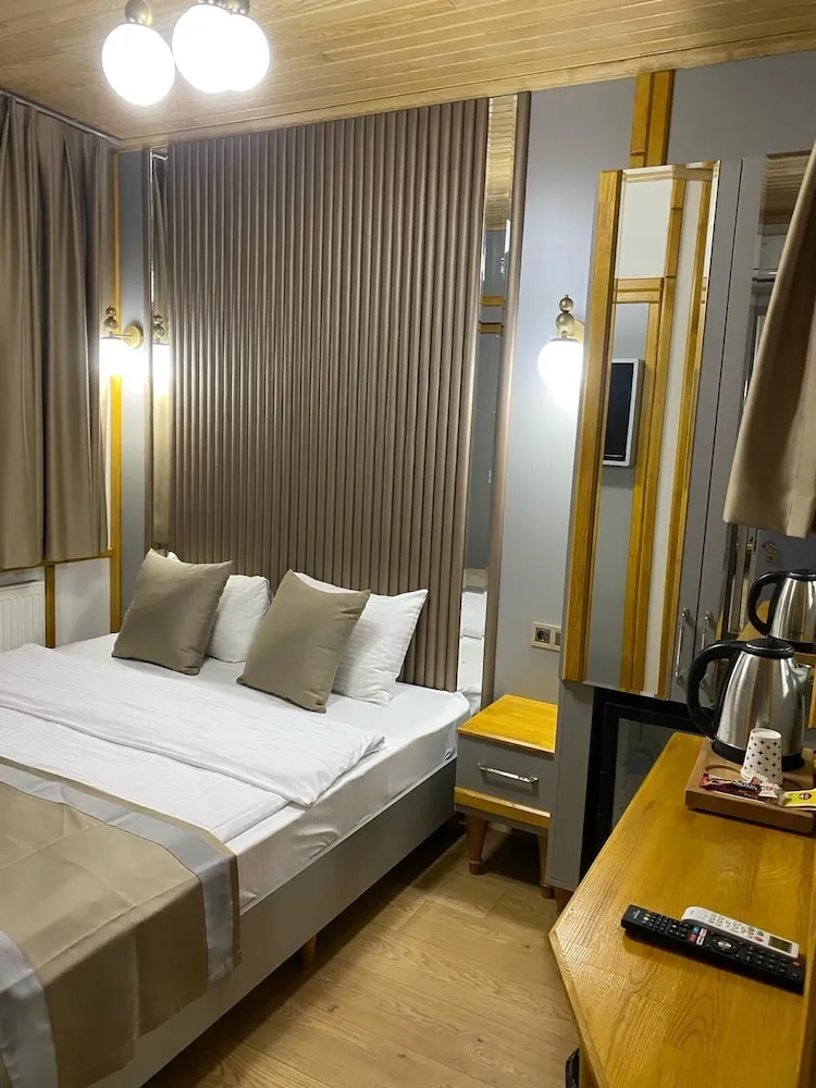 Deluxe Tek Büyük veya İki Ayrı Yataklı Oda