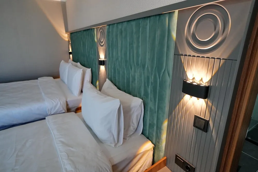 Deluxe Üç Kişilik Oda