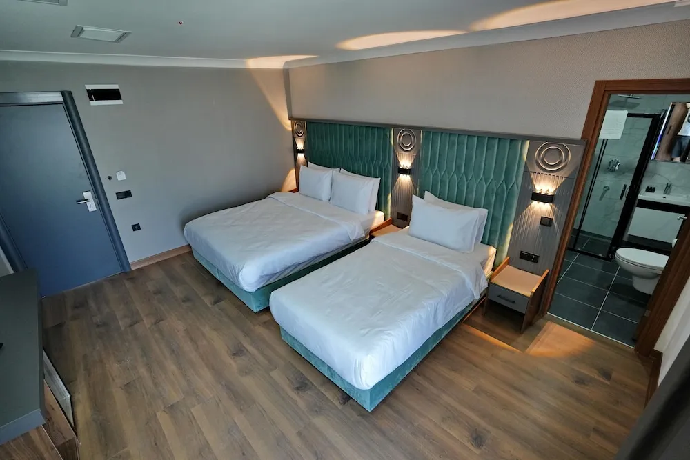 Deluxe Üç Kişilik Oda