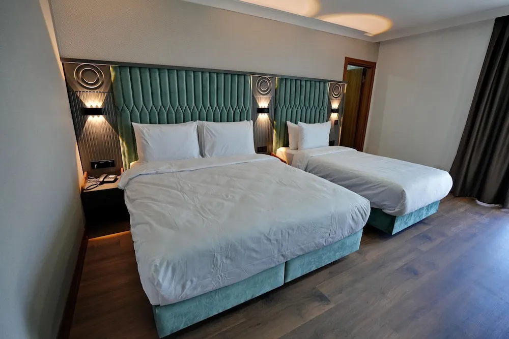 Deluxe Üç Kişilik Oda