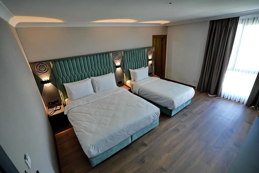 Deluxe Üç Kişilik Oda