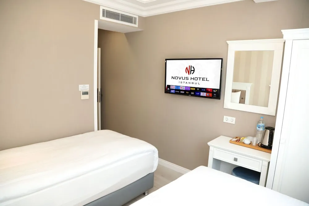 Deluxe Tek Büyük veya İki Ayrı Yataklı Oda