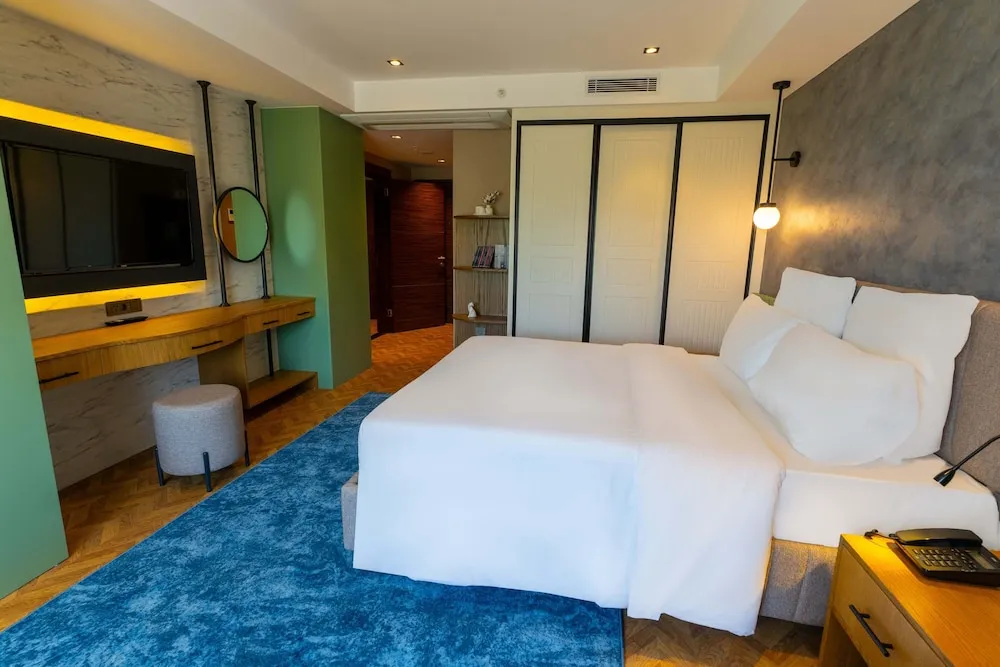 Deluxe Tek Büyük veya İki Ayrı Yataklı Oda