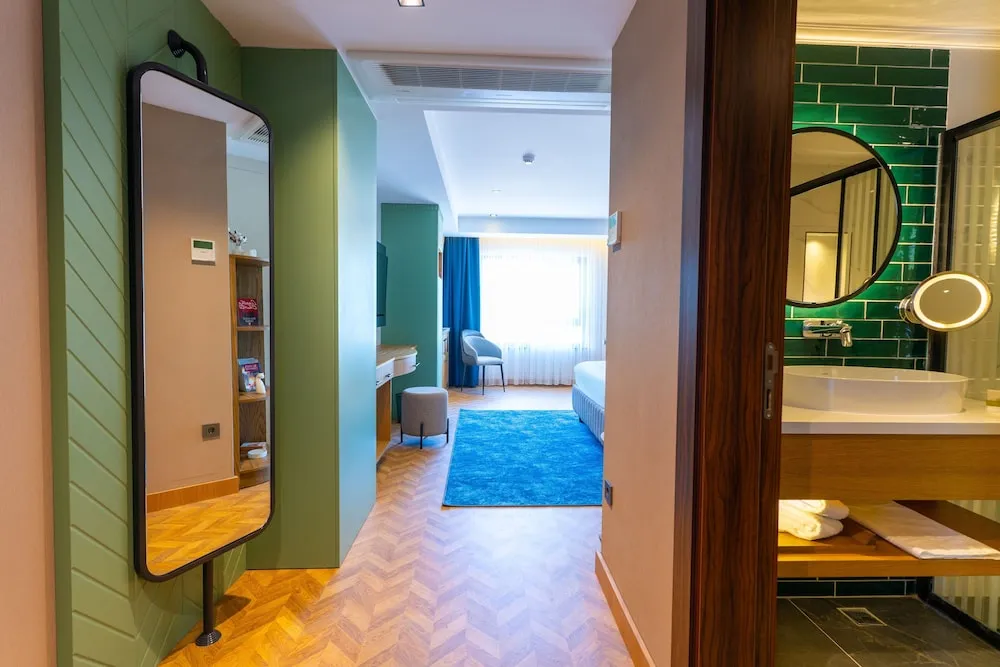 Deluxe Tek Büyük veya İki Ayrı Yataklı Oda