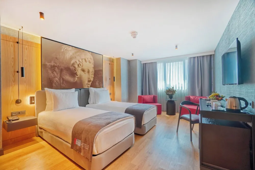 Deluxe Tek Büyük veya İki Ayrı Yataklı Oda
