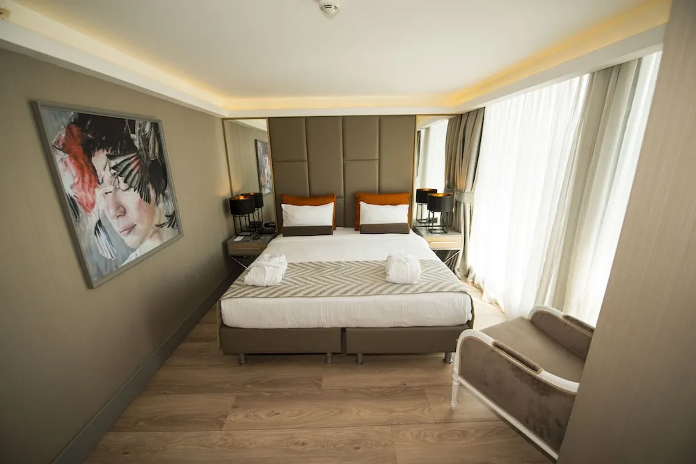 Deluxe Tek Büyük veya İki Ayrı Yataklı Oda, 1 Yatak Odası, Kısmi Deniz Manzaralı