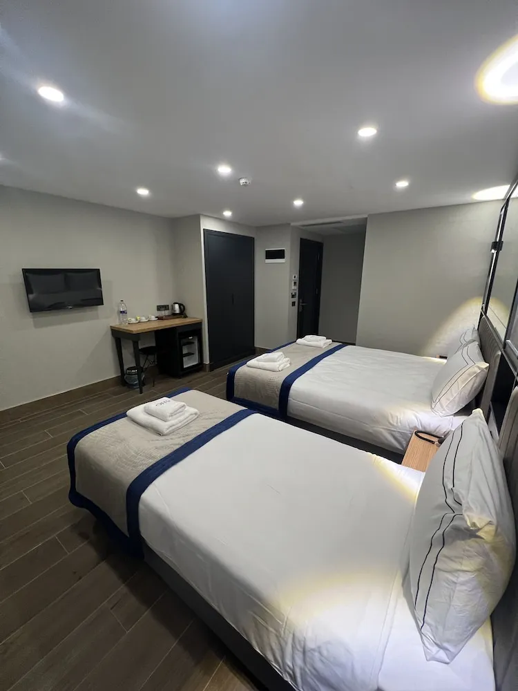 Economy Üç Kişilik Oda