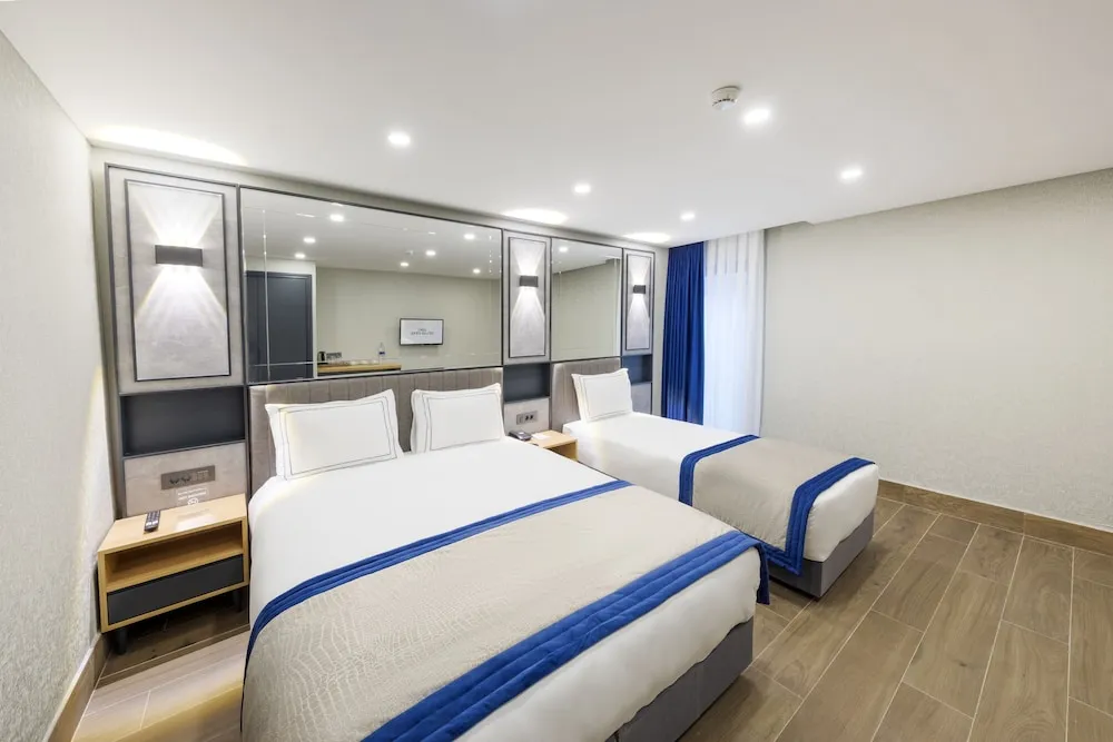 Economy Üç Kişilik Oda