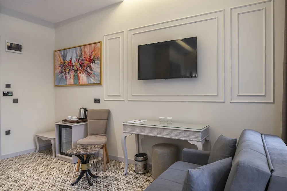 Deluxe Tek Büyük veya İki Ayrı Yataklı Oda