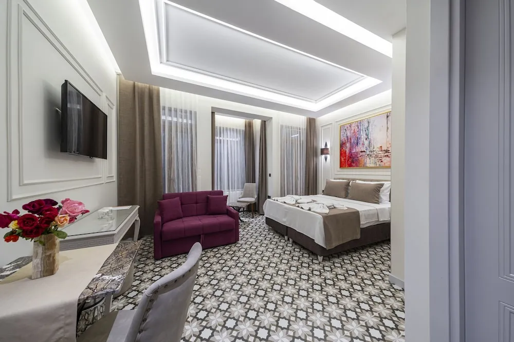 Deluxe Tek Büyük veya İki Ayrı Yataklı Oda