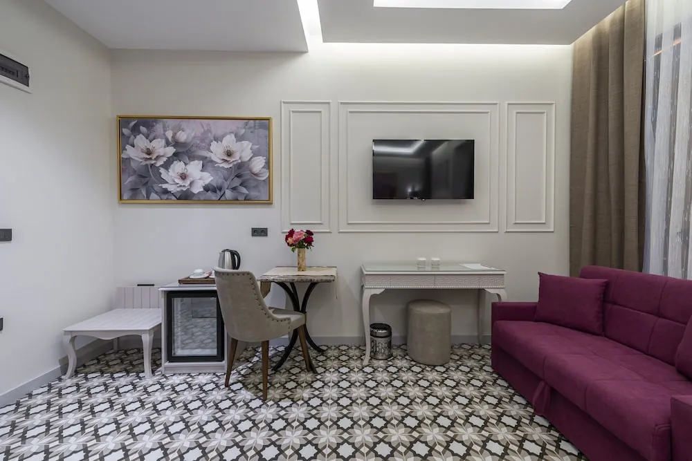 Deluxe Tek Büyük veya İki Ayrı Yataklı Oda