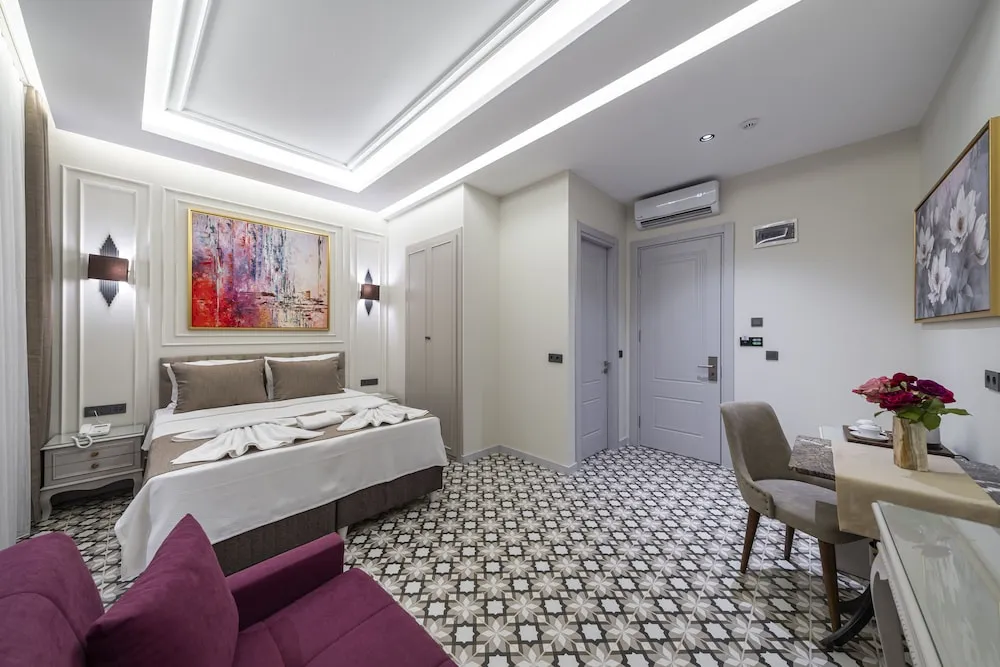 Deluxe Tek Büyük veya İki Ayrı Yataklı Oda