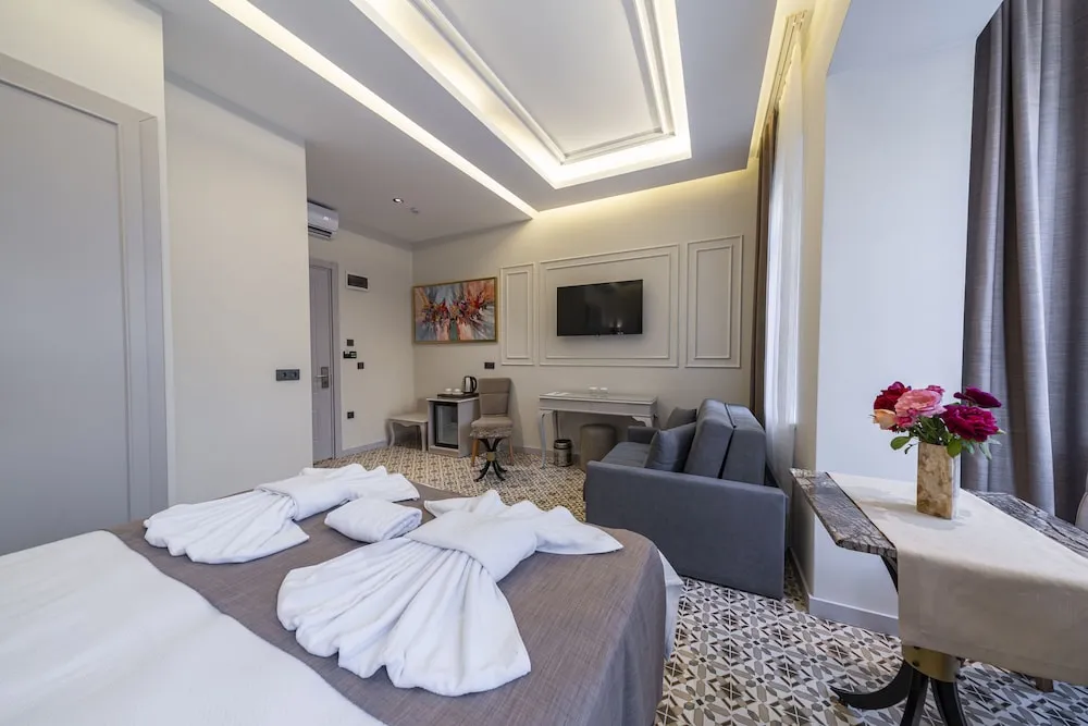 Deluxe Tek Büyük veya İki Ayrı Yataklı Oda