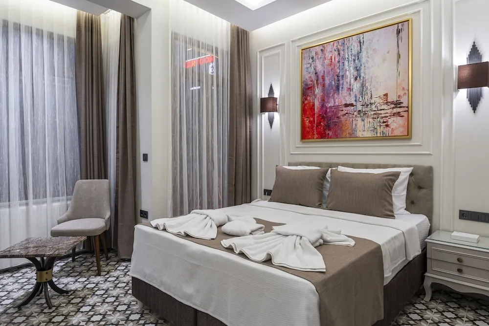 Deluxe Tek Büyük veya İki Ayrı Yataklı Oda