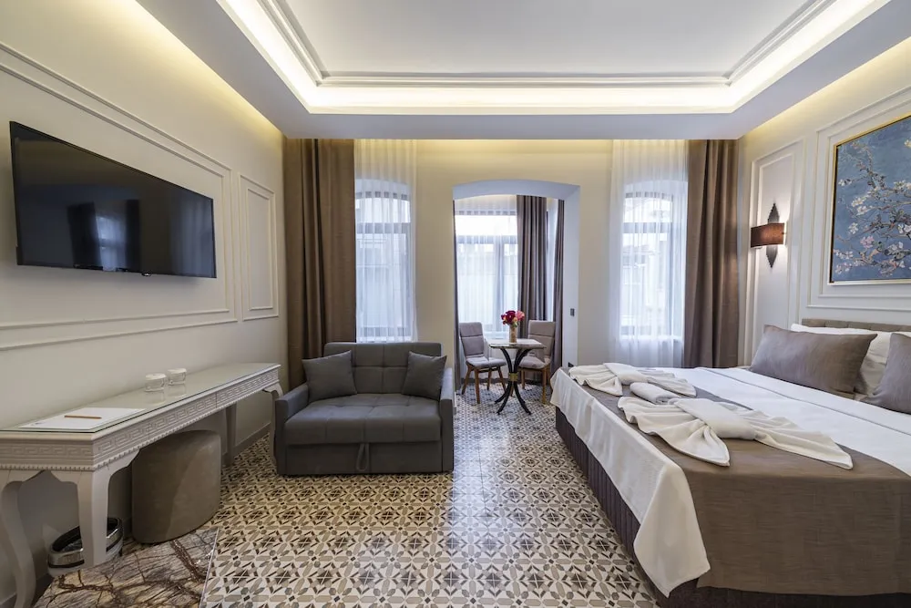 Deluxe Tek Büyük veya İki Ayrı Yataklı Oda