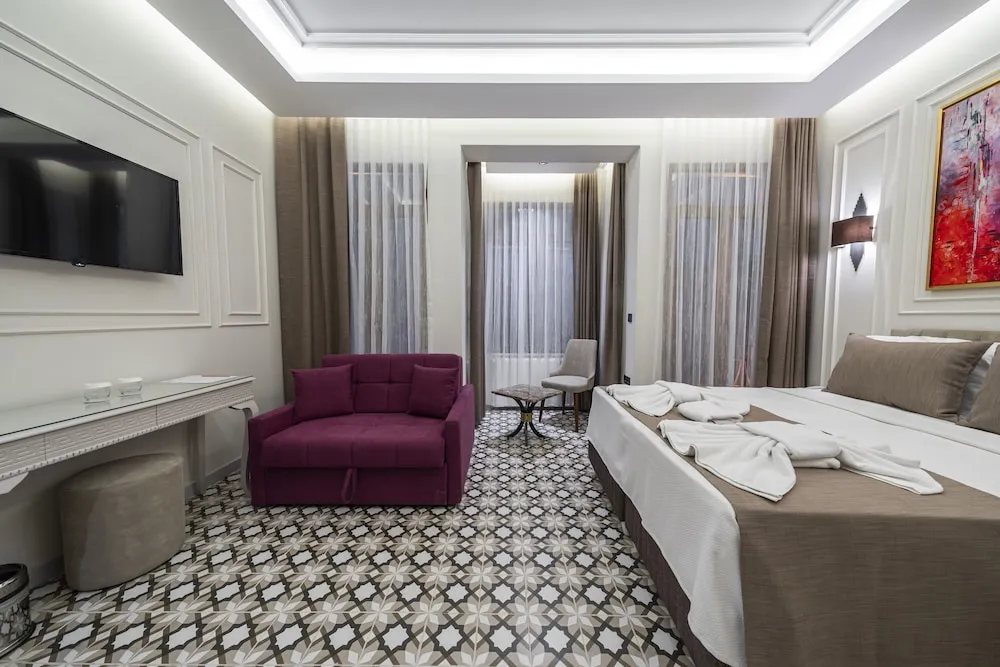 Deluxe Tek Büyük veya İki Ayrı Yataklı Oda