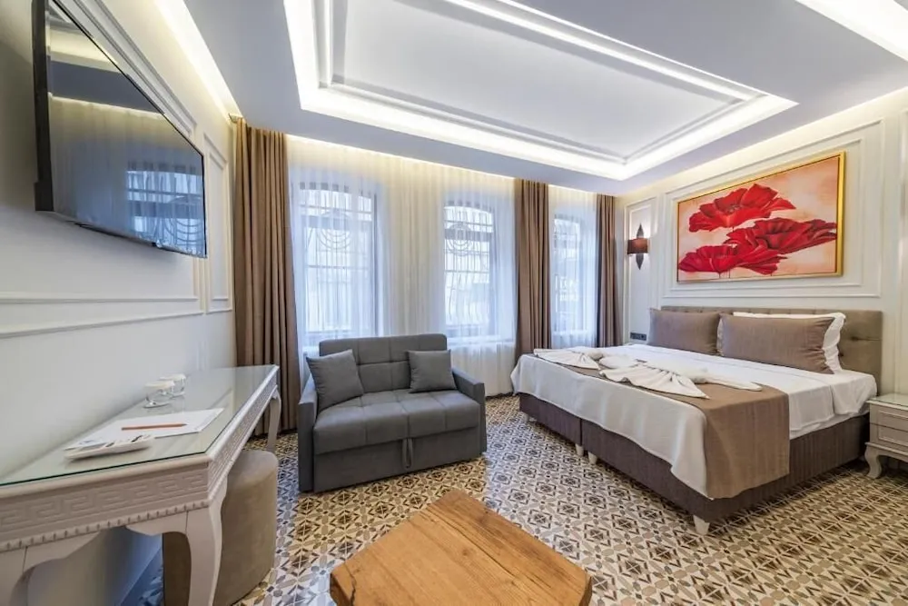 Deluxe Tek Büyük veya İki Ayrı Yataklı Oda