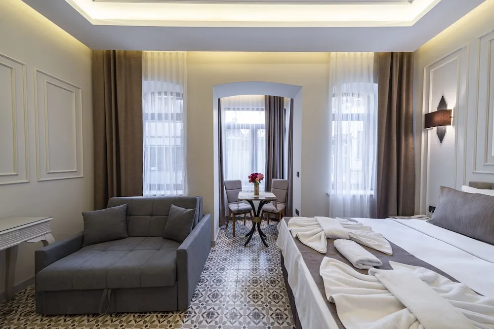 Deluxe Tek Büyük veya İki Ayrı Yataklı Oda