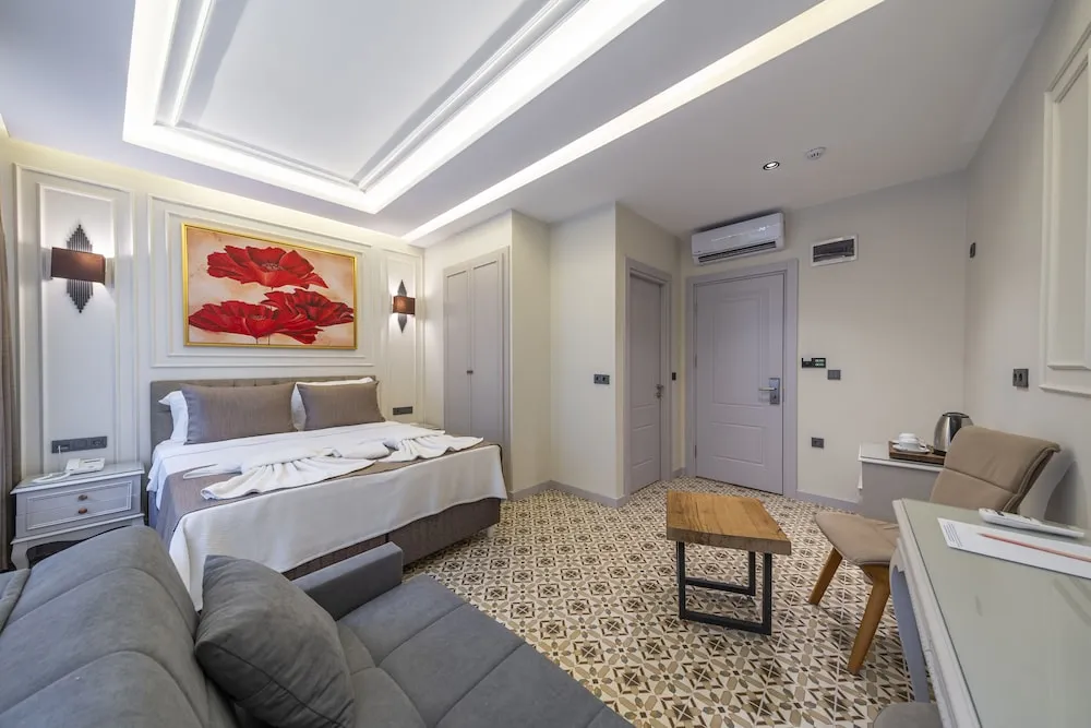 Deluxe Tek Büyük veya İki Ayrı Yataklı Oda