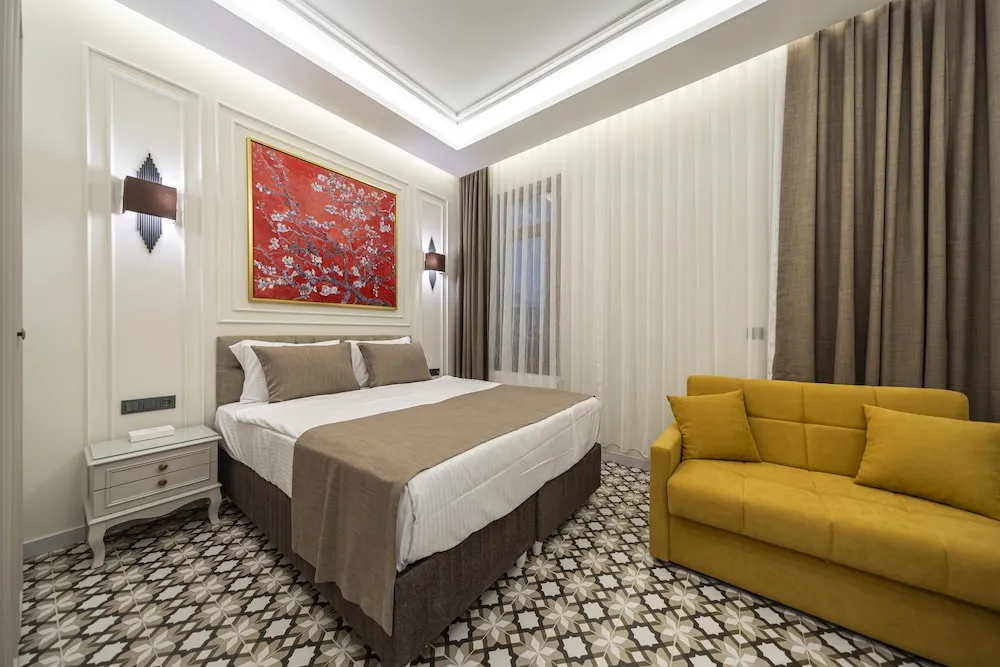 Deluxe Tek Büyük veya İki Ayrı Yataklı Oda