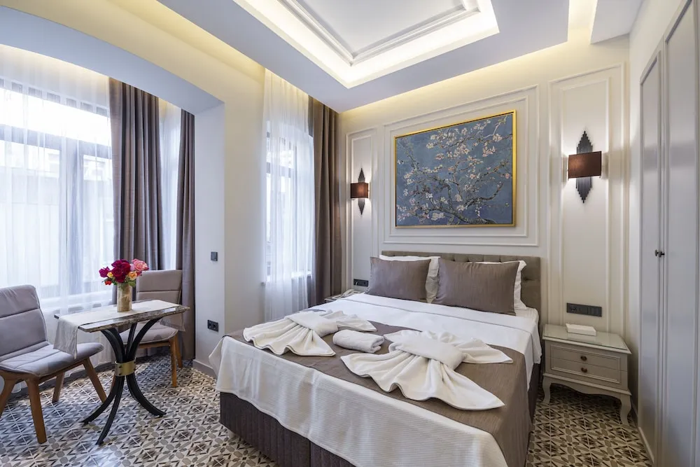 Deluxe Tek Büyük veya İki Ayrı Yataklı Oda