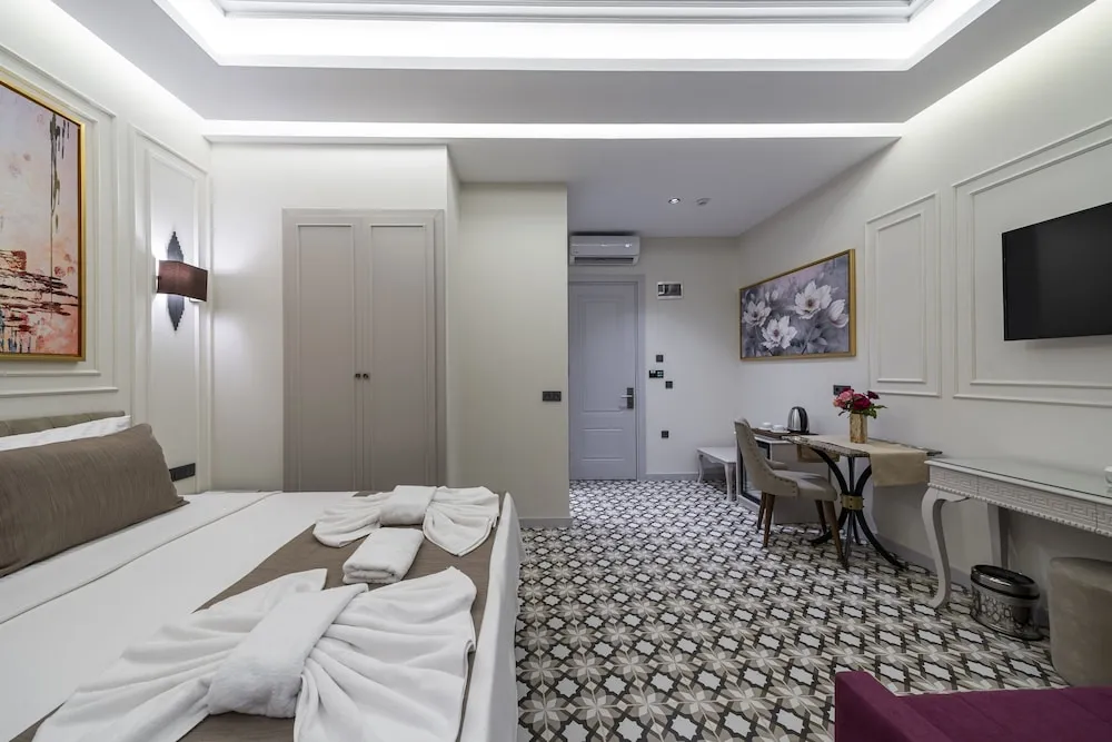 Deluxe Tek Büyük veya İki Ayrı Yataklı Oda