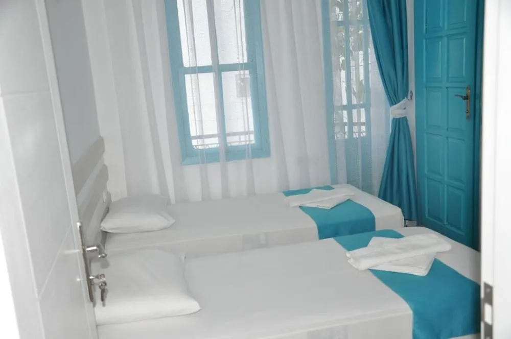 Comfort Tek Büyük veya İki Ayrı Yataklı Oda