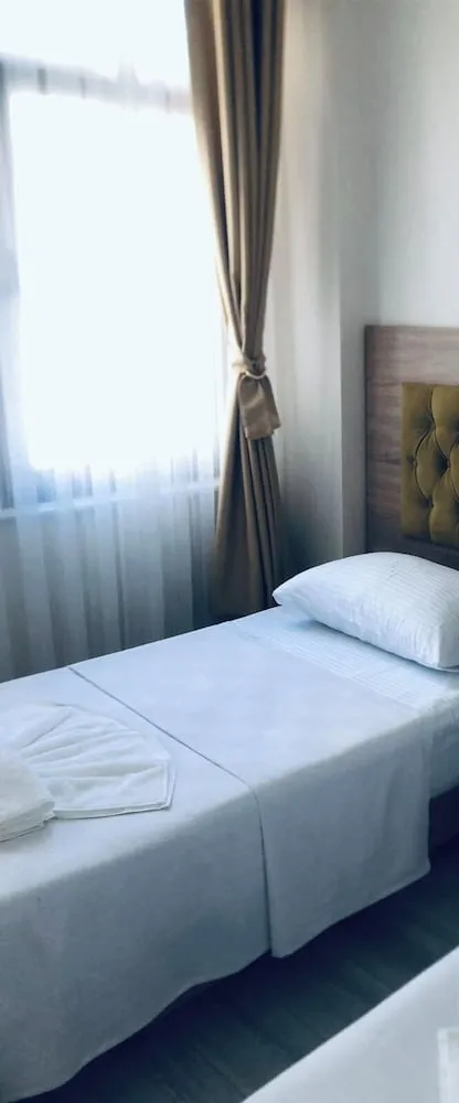 Economy Tek Büyük veya İki Ayrı Yataklı Oda