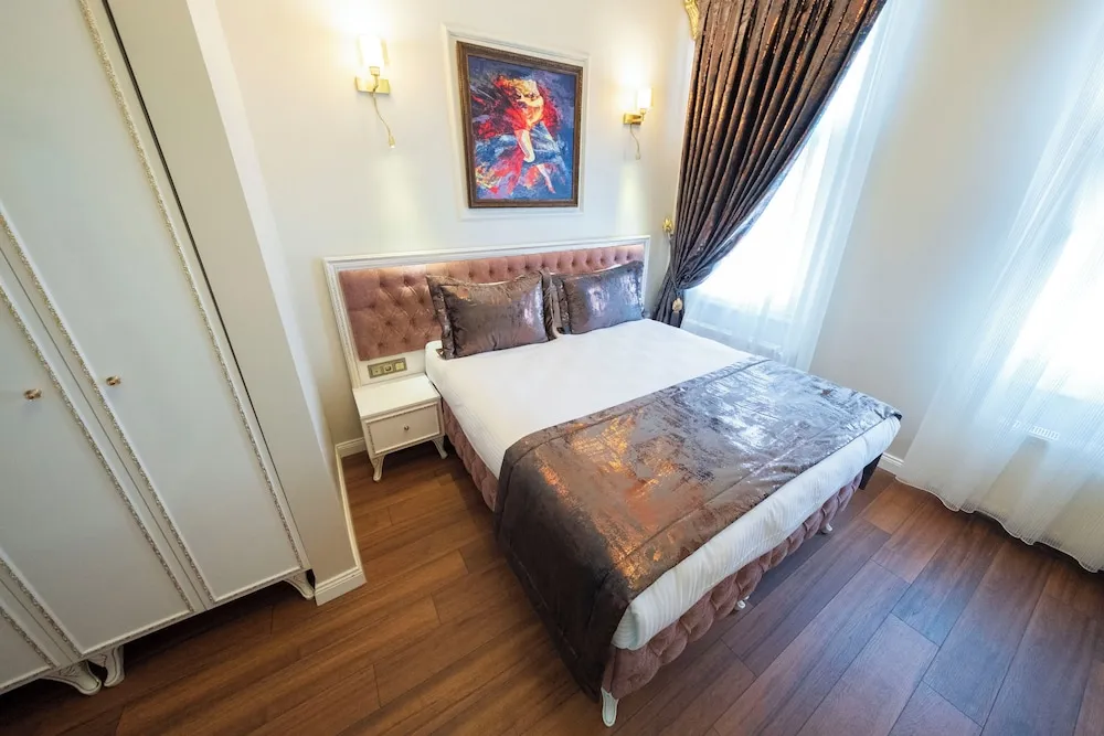 Deluxe Üç Kişilik Oda