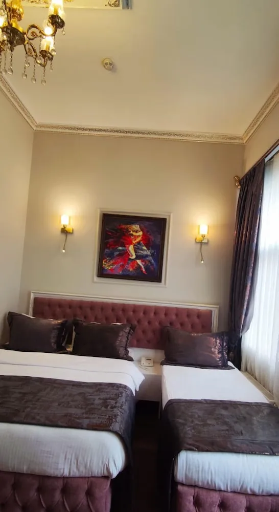 Deluxe Üç Kişilik Oda