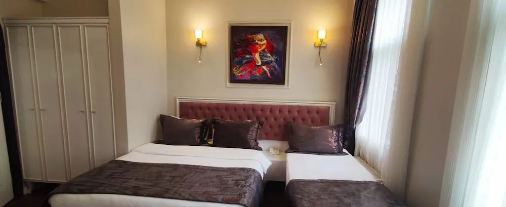 Deluxe Üç Kişilik Oda