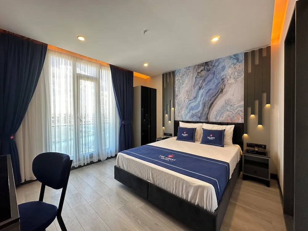 Deluxe Tek Büyük veya İki Ayrı Yataklı Oda