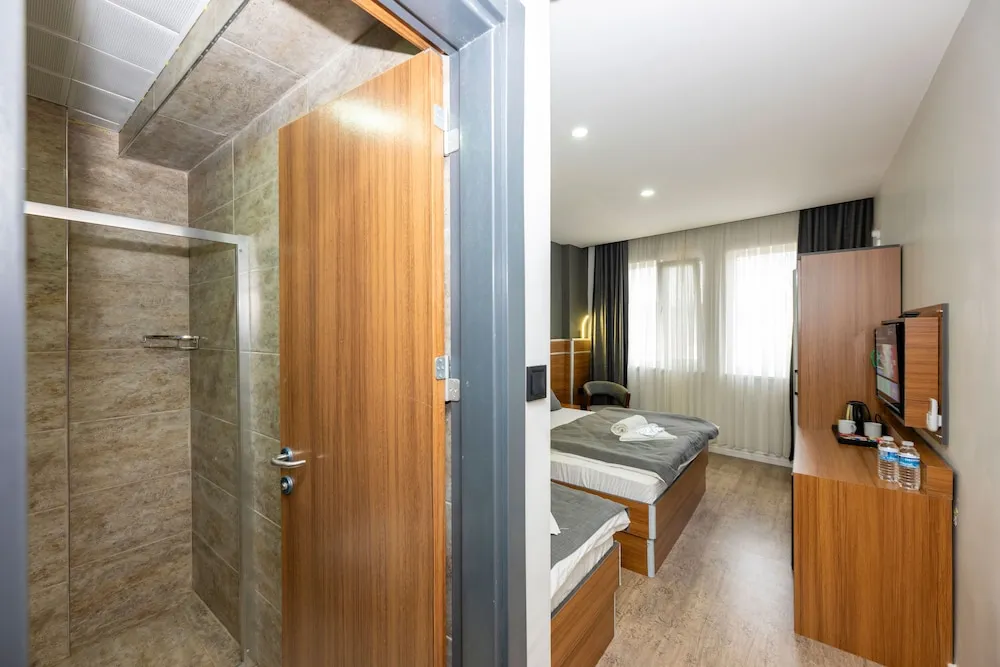 Deluxe Üç Kişilik Oda